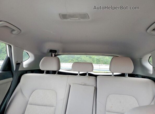 KM8J2CA44JU809346 2018 HYUNDAI TUCSON White Rear seats view