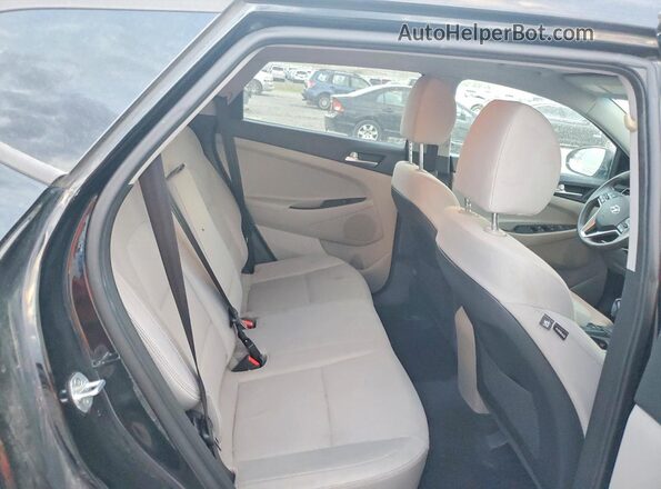 KM8J2CA46LU115163 2020 HYUNDAI TUCSON Black Widok tylnych siedzeń