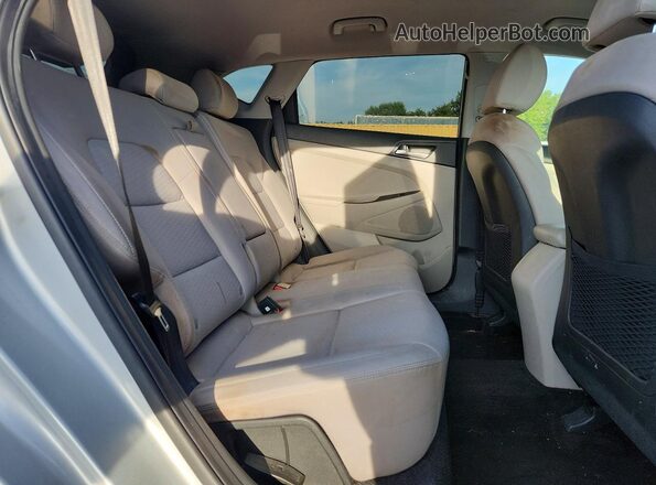 KM8J2CA48KU889123 2019 HYUNDAI TUCSON Silver უკანა სალონის ხედი