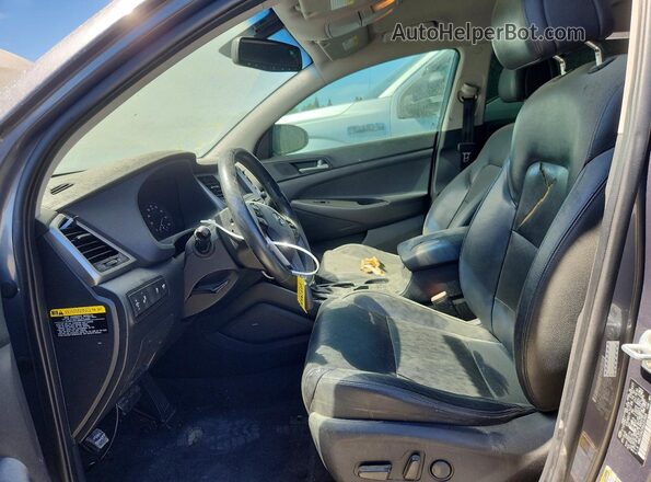 KM8J33A23GU231809 2016 HYUNDAI TUCSON Gray Vista interior delantera