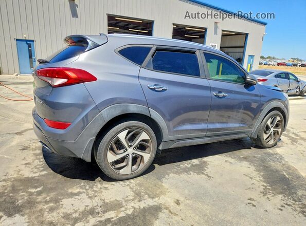 KM8J33A23GU231809 2016 HYUNDAI TUCSON Gray Trasero derecho