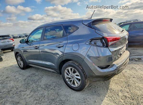 KM8J33A44GU228807 2016 HYUNDAI TUCSON Gray უკანა მარცხენა