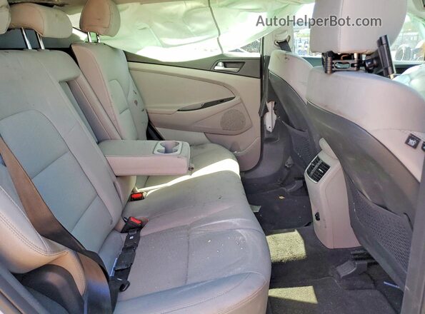 KM8J33AL3KU038609 2019 HYUNDAI TUCSON White Widok wnętrza z tyłu