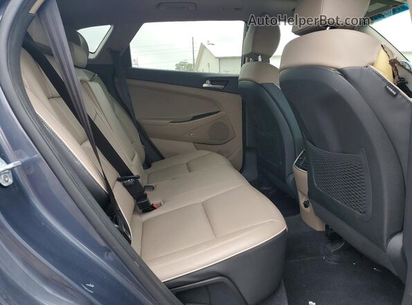 KM8J33AL4KU947474 2019 HYUNDAI TUCSON Gray Vista interior trasera