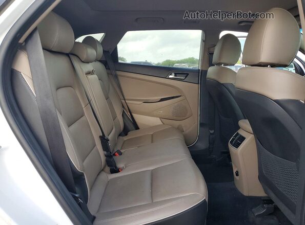 KM8J33AL4MU410963 2021 HYUNDAI TUCSON White Rear seats view