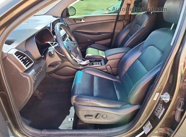 KM8J33AL7KU976855 2019 HYUNDAI TUCSON Brown Widok wnętrza z przodu