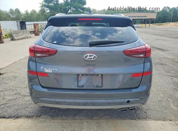 KM8J33AL8MU286521 2021 HYUNDAI TUCSON Charcoal Vista trasera