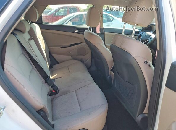 KM8J33AL9LU114822 2020 HYUNDAI TUCSON White Vista interior trasera