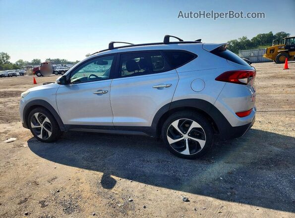 KM8J3CA23GU031853 2016 HYUNDAI TUCSON Серебряный Задняя левая четверть