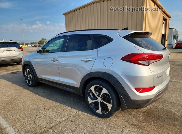 KM8J3CA24GU095075 2016 HYUNDAI TUCSON Silver Trasero izquierdo