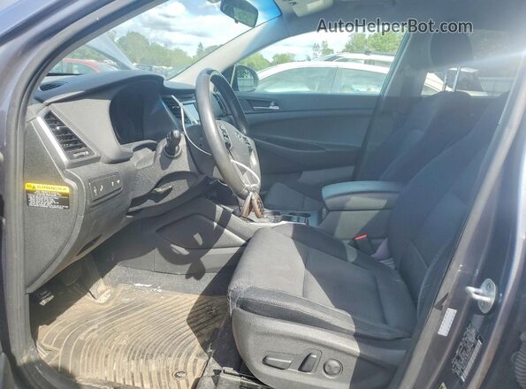 KM8J3CA25GU049142 2016 HYUNDAI TUCSON Gray Front interior view