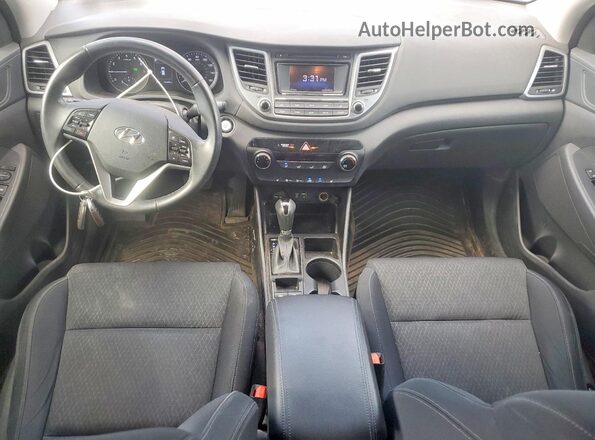 KM8J3CA25GU049142 2016 HYUNDAI TUCSON Gray Dashboard view