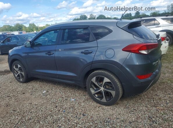 KM8J3CA25GU049142 2016 HYUNDAI TUCSON Gray Rear left