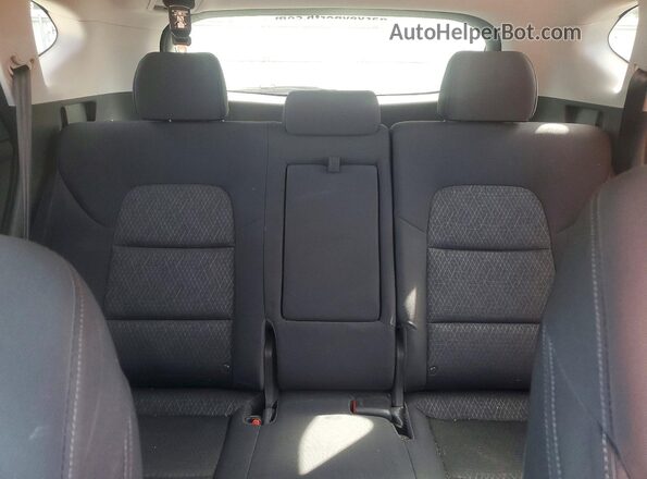 KM8J3CA25GU049142 2016 HYUNDAI TUCSON Gray Rear seats view