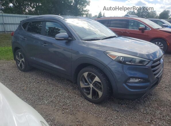 KM8J3CA25GU049142 2016 HYUNDAI TUCSON Gray Front right