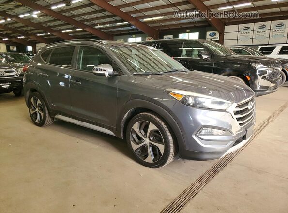 KM8J3CA25JU628543 2018 HYUNDAI TUCSON Gray Delantero derecho