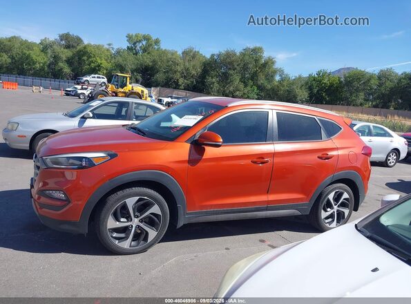 KM8J3CA29GU068180 2016 HYUNDAI TUCSON Orange 360 interior view