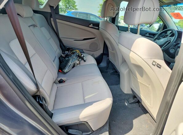 KM8J3CA43HU437585 2017 HYUNDAI TUCSON Серый Вид задних сидений