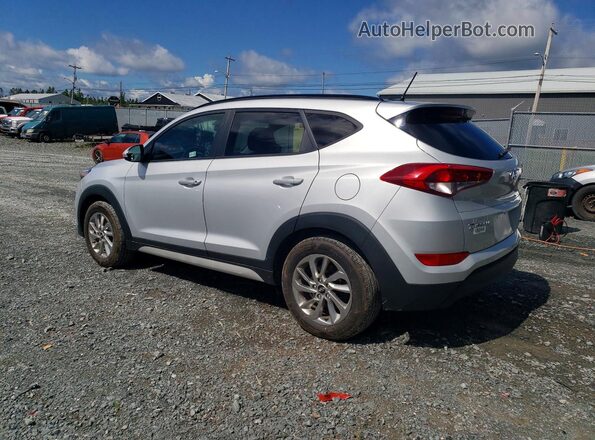 KM8J3CA43HU516433 2017 HYUNDAI TUCSON Silver Trasero izquierdo