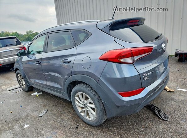 KM8J3CA44GU210467 2016 HYUNDAI TUCSON Gray Rear left