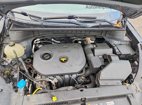 KM8J3CA44GU210467 2016 HYUNDAI TUCSON Gray Engine compartment view