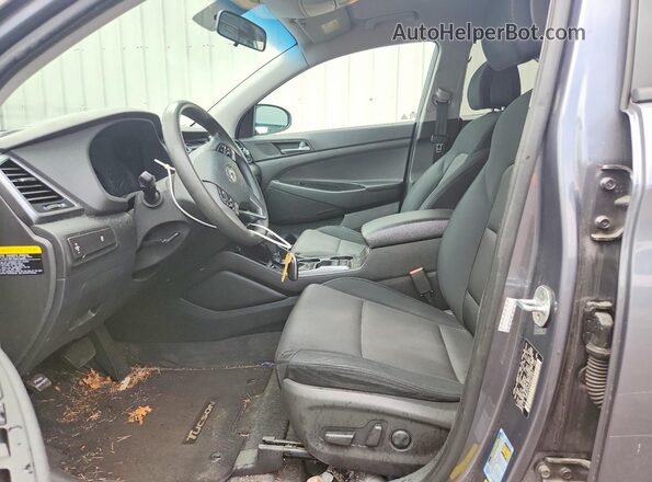 KM8J3CA44GU210467 2016 HYUNDAI TUCSON Gray Front interior view
