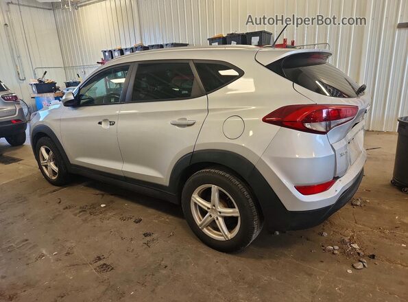 KM8J3CA46GU093202 2016 HYUNDAI TUCSON Silver Rear left