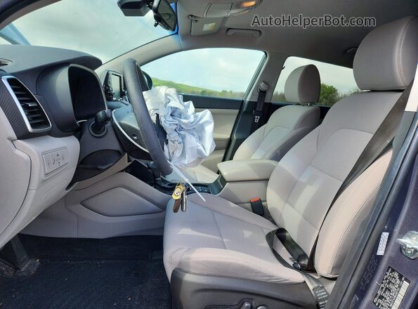 KM8J3CA48MU389740 2021 HYUNDAI TUCSON Silver წინა სალონის ხედი