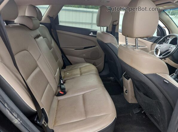 KM8J3CAL5KU887074 2019 HYUNDAI TUCSON Black Вид задньої частини салону