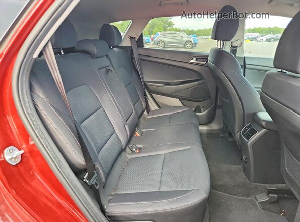 KM8J3CALXKU845404 2019 HYUNDAI TUCSON Maroon Rear interior view