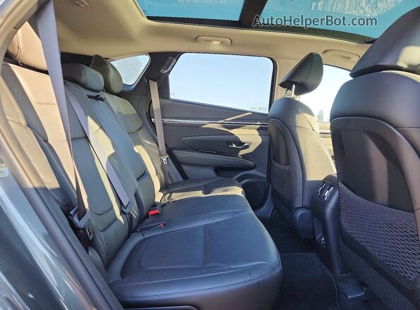 KM8JECAE4NU052518 2022 HYUNDAI TUCSON Green Rear interior view