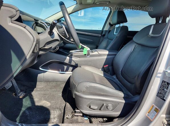 KM8JECD1XRU148507 2024 HYUNDAI TUCSON Gray Vista interior delantera