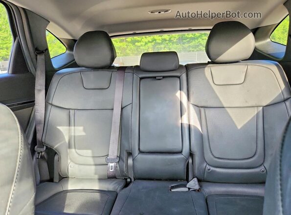 KM8JFCA15PU087436 2023 HYUNDAI TUCSON Black Vista de los asientos traseros
