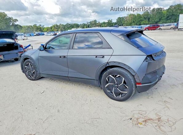 KM8KNDAF3PU198138 2023 HYUNDAI IONIQ Gray Trasero izquierdo