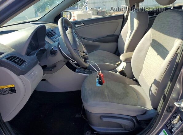 KMHCT4AE0GU163994 2016 HYUNDAI ACCENT Gray Front interior view