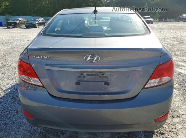 KMHCT4AE0GU163994 2016 HYUNDAI ACCENT Gray Rear view