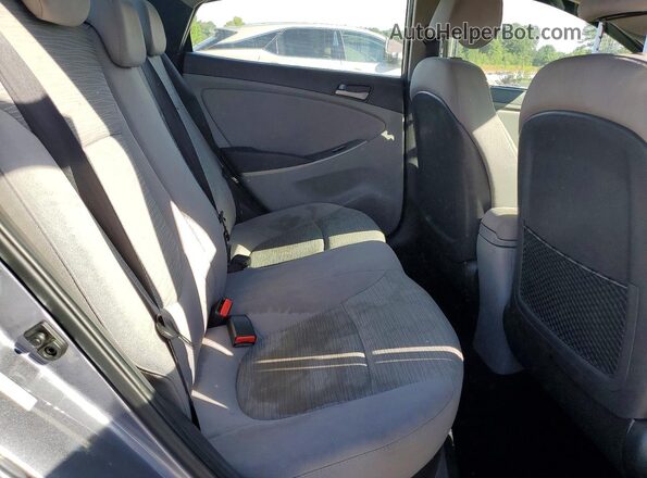 KMHCT4AE0GU163994 2016 HYUNDAI ACCENT Gray Rear seats view