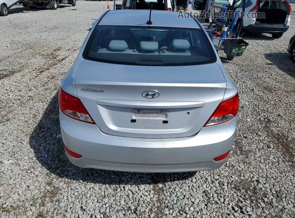 KMHCT4AE1GU075942 2016 HYUNDAI ACCENT Silver Rear view