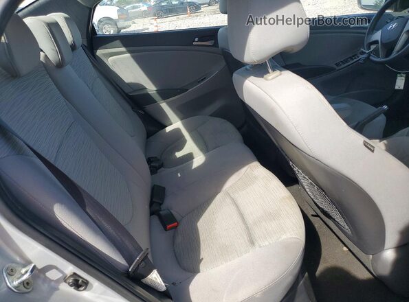 KMHCT4AE1GU075942 2016 HYUNDAI ACCENT Silver Rear seats view