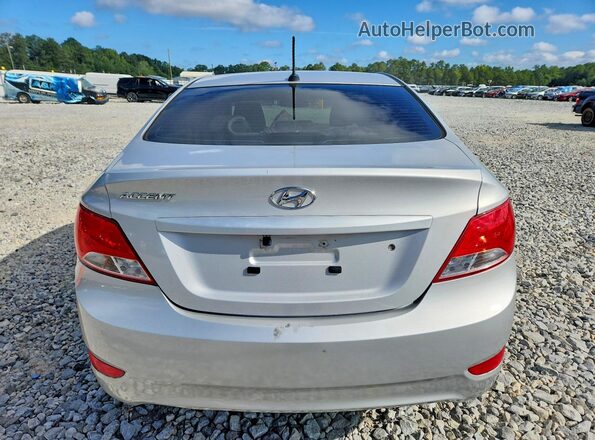 KMHCT4AE2GU007925 2016 HYUNDAI ACCENT Серебряный Вид сзади