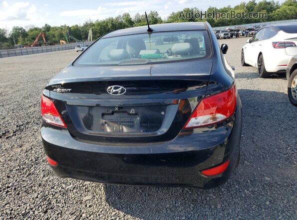 KMHCT4AE3HU375502 2017 HYUNDAI ACCENT Black Rear view