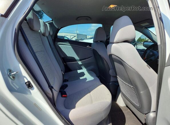 KMHCT4AE8GU091118 2016 HYUNDAI ACCENT White Rear seats view