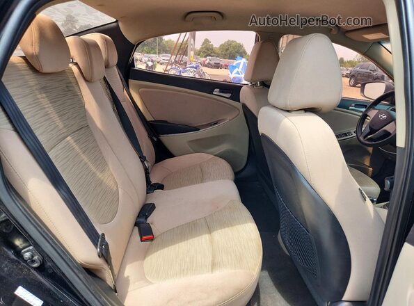 KMHCT4AE8HU355486 2017 HYUNDAI ACCENT Black Vista de los asientos traseros
