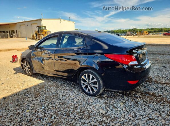 KMHCU4AE0GU159764 2016 HYUNDAI ACCENT Black Հետևի ձախ