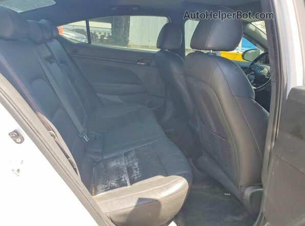 KMHD04LB1JU483235 2018 HYUNDAI ELANTRA White Vista de los asientos traseros
