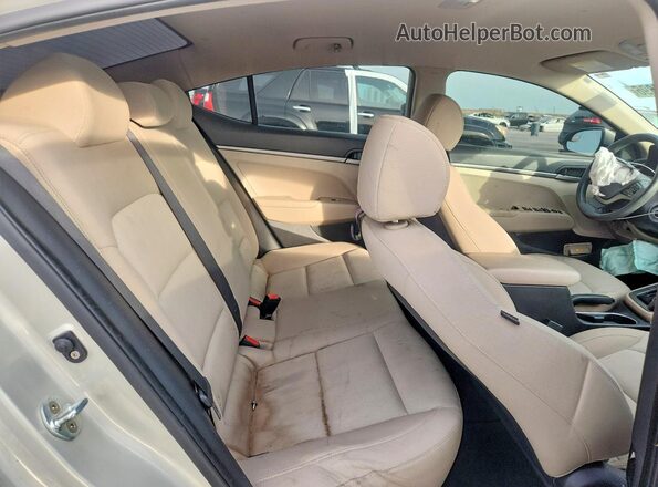 KMHD74LF5HU392008 2017 HYUNDAI ELANTRA Beige Հետևի նստատեղերի տեսք