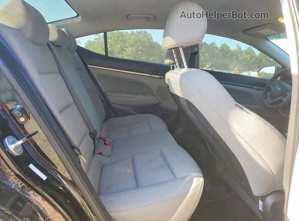 KMHD84LF1JU574209 2018 HYUNDAI ELANTRA Black Rear seats view