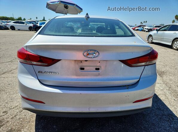 KMHD84LF9JU609563 2018 HYUNDAI ELANTRA Silver წინა სალონის ხედი