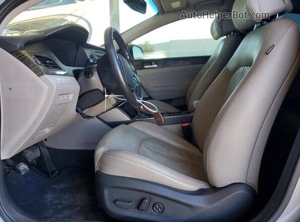 KMHE34L19GA022216 2016 HYUNDAI SONATA Silver Front interior view