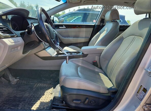 KMHE34L19GA036357 2016 HYUNDAI SONATA Серебряный Вид салона спереди